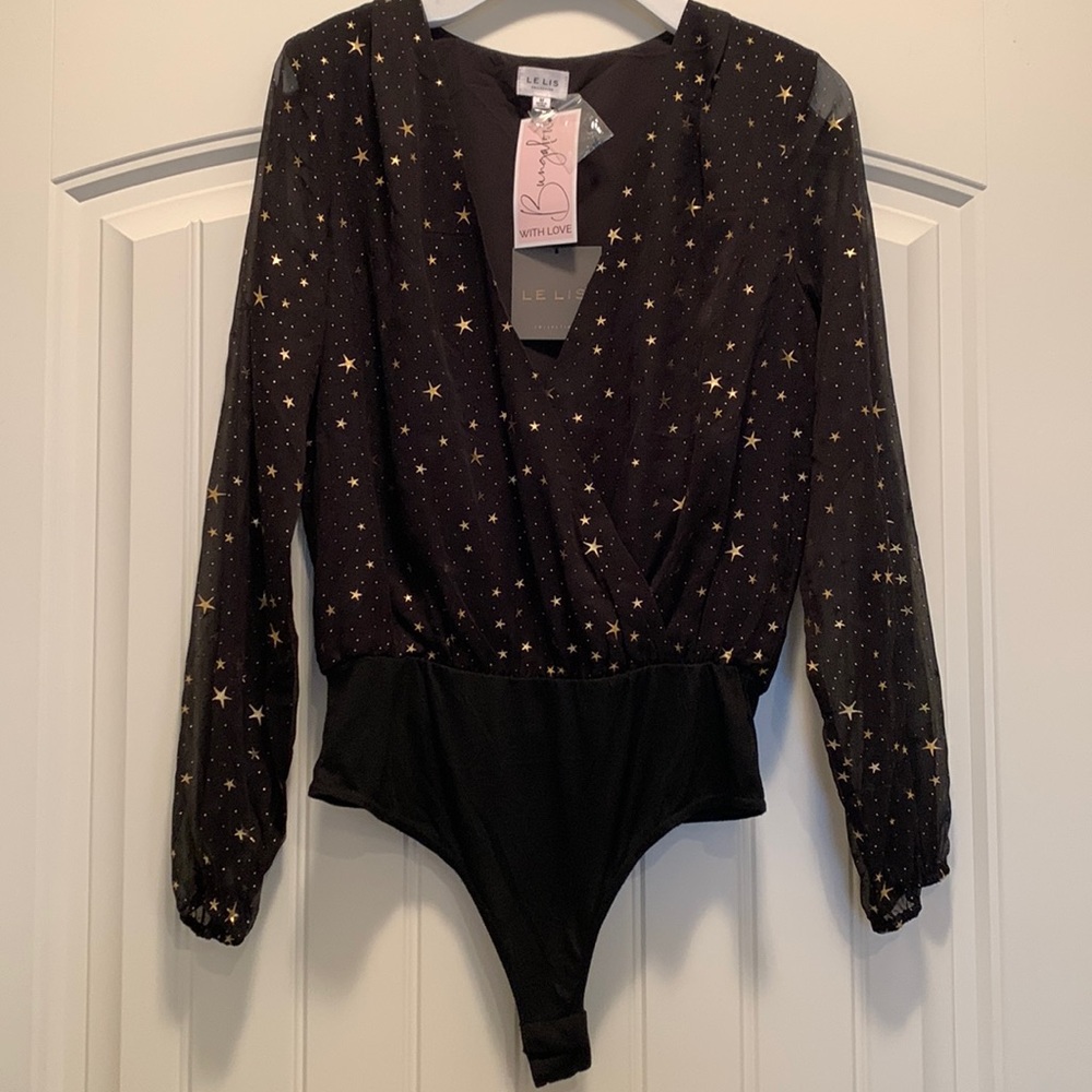 NWT Le Lis black with gold stars bodysuit.